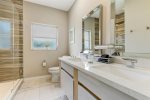 Full hallway-bathroom: double-vanity eliminates clutter